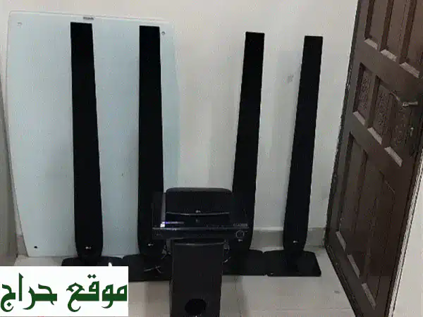تجربة سينمائية منزلية: نظام مسرح LG 5.1 صوت...