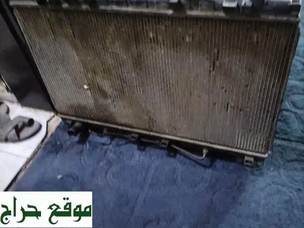 جدد كيا كرنفال 2014: مراوح، فوانيس، رادياتير - قطع غيار أصلية لسيارتك!