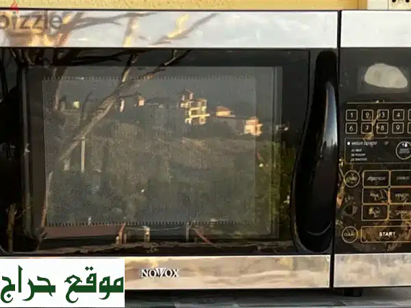 فرن مايكرويف نوفوكس M8201: سرعة، سهولة، وأداء رائع!