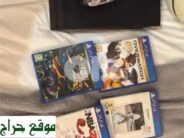 عرض PS4 أسطوري: بلايستيشن 4 أسود بحالة ممتازة + 5 ألعاب ويد تحكم إصدار خاص!