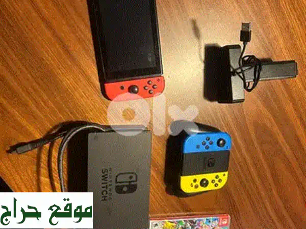 نينتندو سويتش بحالة ممتازة | حزمة كاملة مع عجلة قيادة وجميع الملحقات (جاهز للعب!) 3
