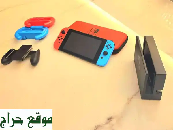 نينتندو سويتش بحالة ممتازة | حزمة كاملة مع عجلة قيادة وجميع الملحقات (جاهز للعب!)