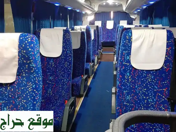 رحلتك للقرية العالمية دبي: تأجير باصات فاخرة | راحة، أمان، وأسعار تنافسية 2