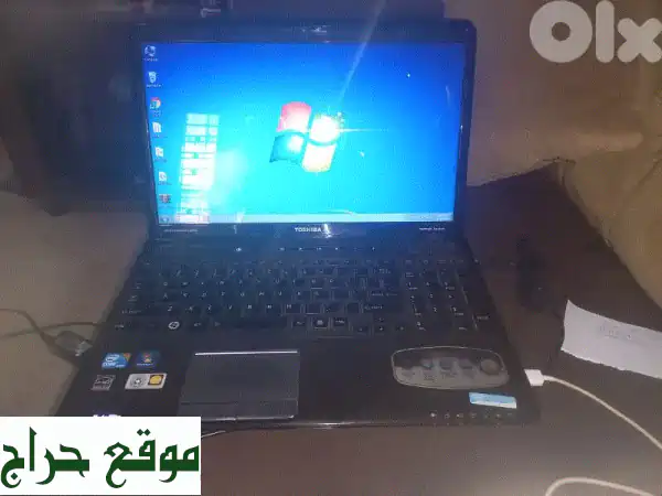 لاب توب توشيبا Satellite A665 Core i3: أداء موثوق بحالة ممتازة وشاشة 15 بوصة - جاهز للعمل!