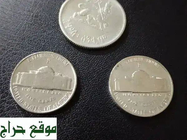 اقتنِ التاريخ: عملة الإمبراطور هيلا سيلاسي النادرة (1944) وعملات الحرب العالمية الثانية الفضية الأمريكية! 2
