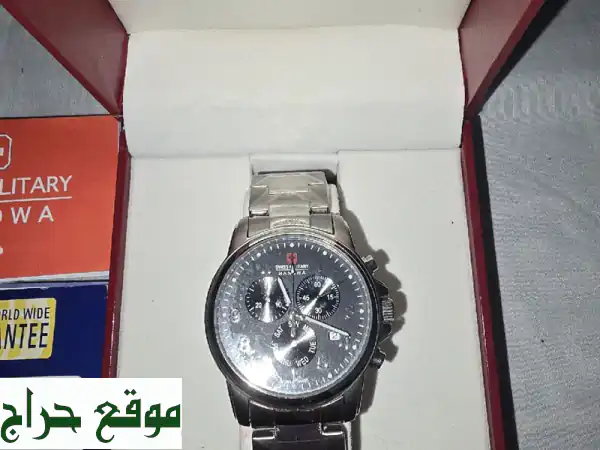 فرصة ذهبية: ساعة فاخرة بحالة الوكالة (لم تلبس قط!) مع جميع أوراقها الأصلية - أناقة لا تُضاهى! 3