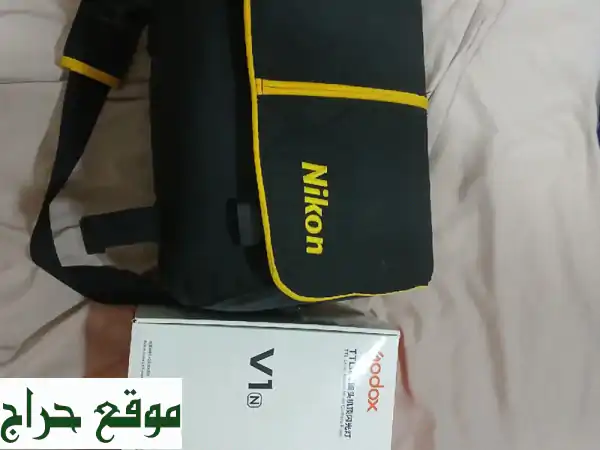 التقط أجمل اللحظات! كاميرا نيكون D5100 شبه جديدة + 2 عدسة و2 بطارية و64GB