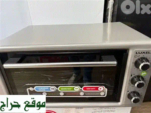 فرن كهربائي لوكسيل 50 لتر: طهي احترافي بمروحة وإضاءة وزجاج مزدوج + هدية قطاعة طعام! 4