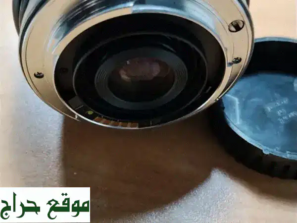 عدسة Sigma UC Zoom 70-210mm f/4-5.6: تيليفوتو زوم كانون EF يابانية (أوتوفوكس) 2