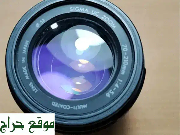 عدسة Sigma UC Zoom 70-210mm f/4-5.6: تيليفوتو زوم كانون EF يابانية (أوتوفوكس)