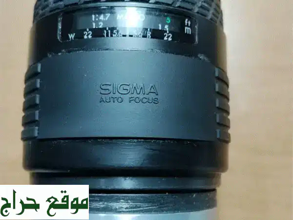 عدسة Sigma UC Zoom 70-210mm f/4-5.6: تيليفوتو زوم كانون EF يابانية (أوتوفوكس) 3