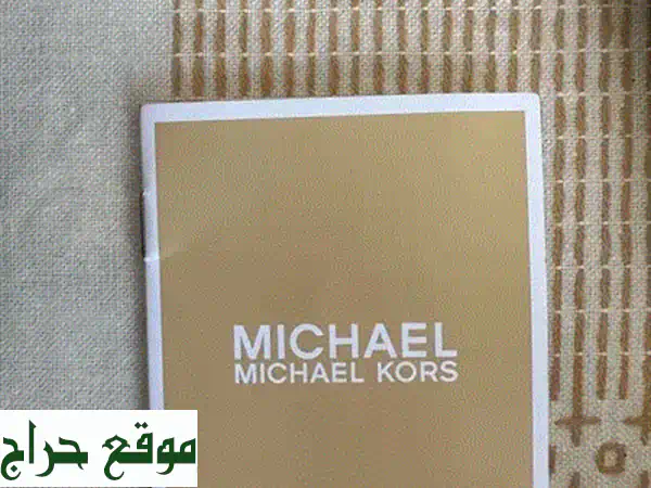 اكتشفي أناقة مايكل كورس الأصلية: حقيبة نسائية فاخرة لكل مناسباتك! 3