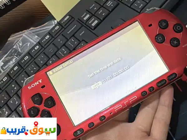 جهاز psp 3000 مستعمل، تم اختبار التشغيل. لون أحمر...