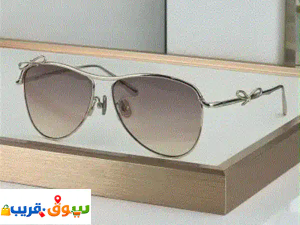 نظارة شمسية نسائية بتصميم أنيق وفاخر للبيع اطار معدني ذهبي بتفاصيل مميزة على شكل فيونكة، وعدسات ... 3