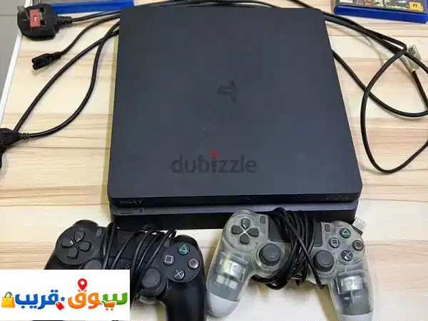 Ps4 slim 1 TB with 2 controllers and 3 games in CD form 2