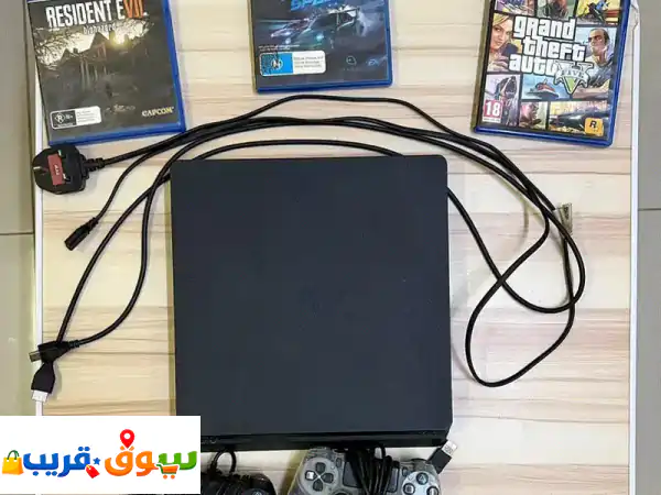 Ps4 slim 1 TB with 2 controllers and 3 games in CD form