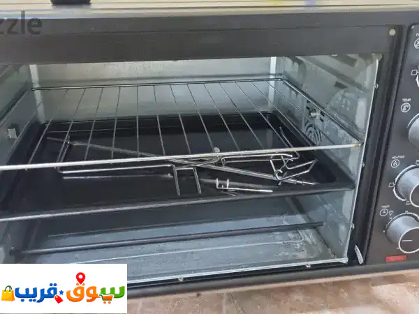 فرصة ذهبية: فرن كهربائي 60 لتر بحالة ممتازة (كالجديد) - للبيع الفوري! 3
