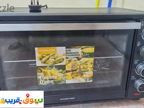 فرصة ذهبية: فرن كهربائي 60 لتر بحالة ممتازة (كالجديد) - للبيع الفوري!
