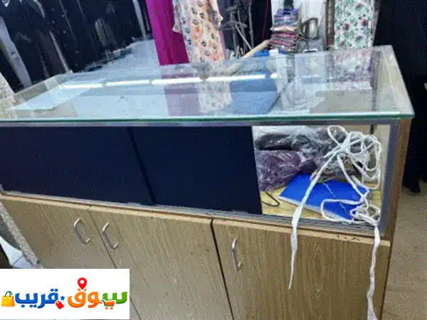 تصفية محل ملابس كل أغارضة جديدة ليها شهرين فقط متاح كمية ملكانات وبترينه خشب وزجاج عمولة واستندات ... 4