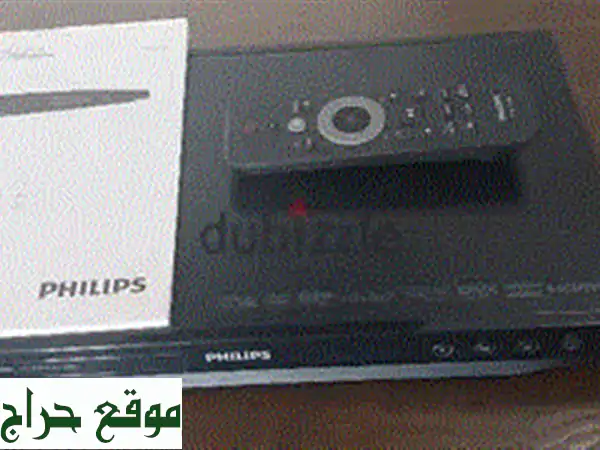 Philips DVD Player with remote control, cables, and manual.