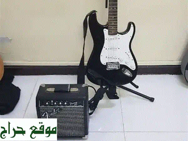للعازف الطموح: باقة Fender Squier 2001 وجيتار أمب 15W |...