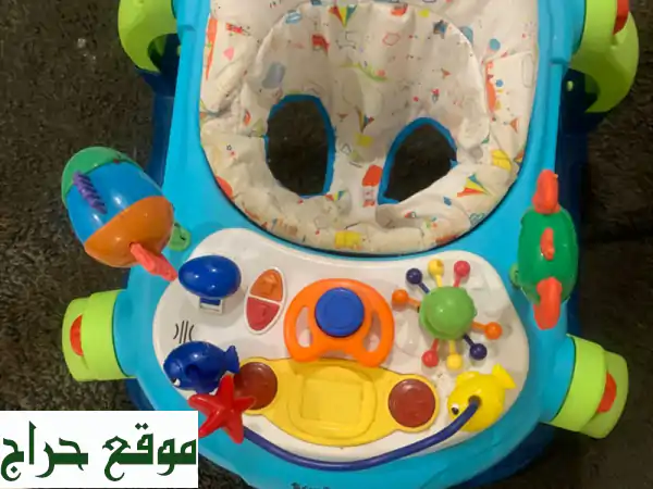 للبيع: مشاية أطفال تفاعلية شبه جديدة 👶 بأصوات وموسيقى تعليمية! 🎶 (تحتاج بطارية فقط) - فرصة لا تعوض!