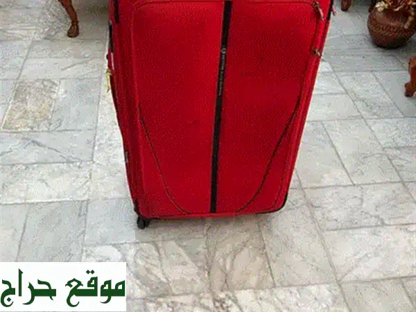 شنطة سفر أصلية حجم وسط: رفيقك الأمثل لرحلات بلا قلق وأناقة لا مثيل لها!