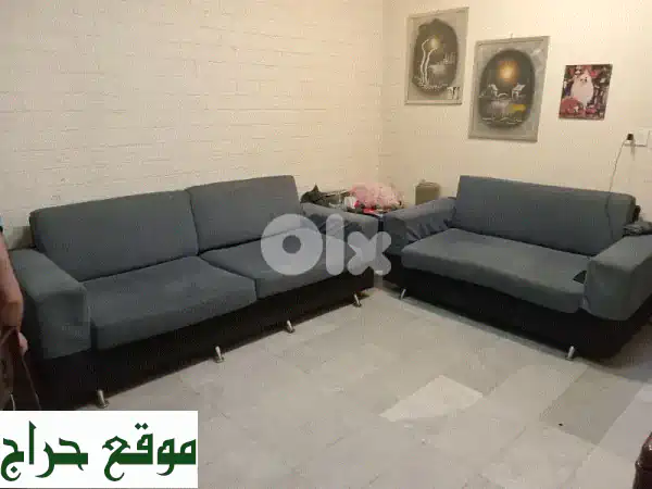 كنب أزرق أنيق للبيع: طقم صوفيات بحالة ممتازة -...