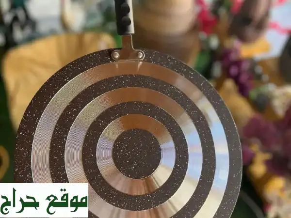 اكتشف صاج الخبز المثالي: قاعدة توزيع حراري، مقاسين، وتوصيل مجاني!