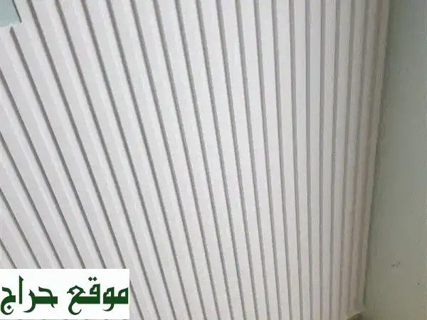 تألق وفخامة: تركيب وتصميم واجهات بديل الخشب...