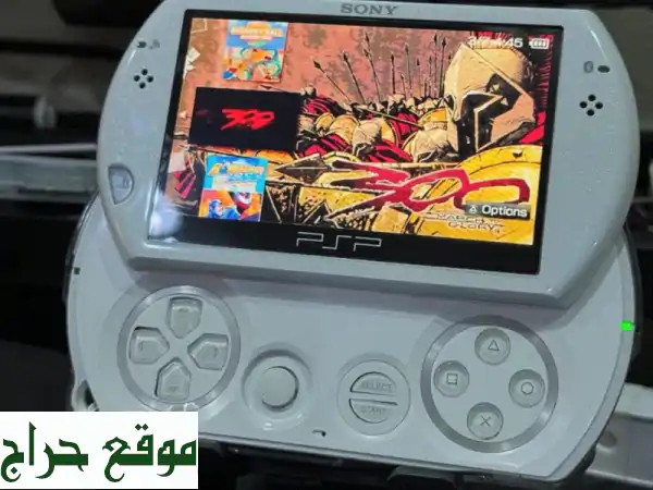 سوني PSP GO أبيض - بحالة ممتازة! 128 جيجا، 160 لعبة،...