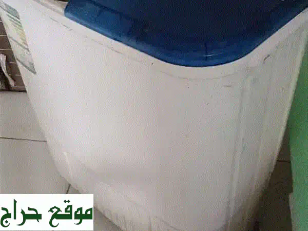 غسالة و مجفف ملابس بحالة ممتازة - دمام! 🧼✨