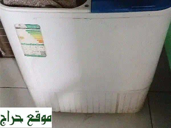 غسالة و مجفف ملابس بحالة ممتازة - دمام! 🧼✨