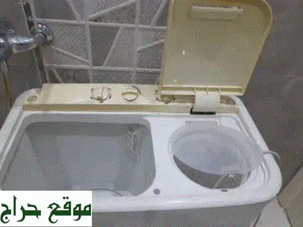 غسالة ملابس 200 ريال فقط! (للبيع بسبب السفر) - فرصة لا تُفوّت!