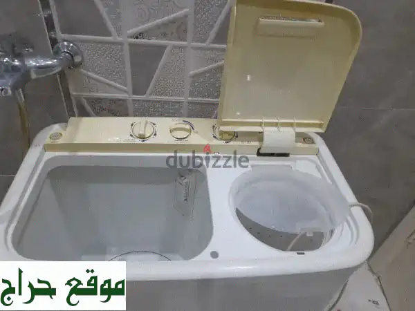 غسالة ملابس 200 ريال فقط! (للبيع بسبب السفر) - فرصة...