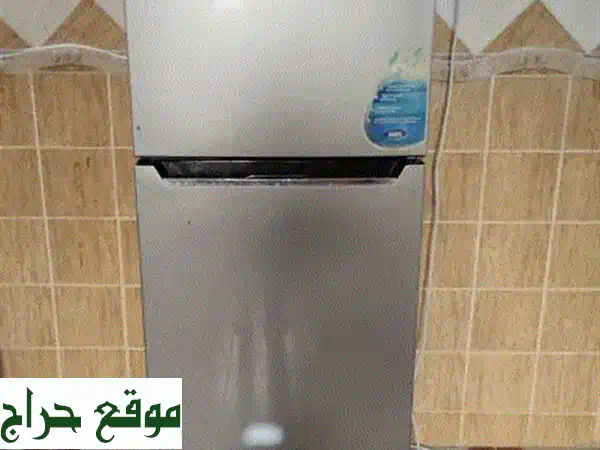 ثلاجة بابين بحالة ممتازة - فرصة مميزة قبل الانتقال!