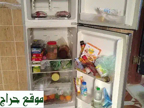 ثلاجة بابين بحالة ممتازة - فرصة مميزة قبل الانتقال!