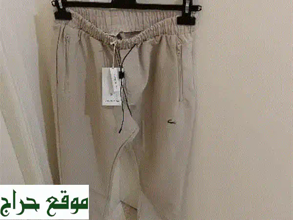 بنطلون لاكوست رجالي XL -  عرض لا يُفوّت! 15$ فقط!