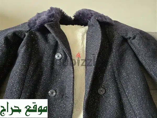 معطف مينوتي أنيق - 34 عاماً من الدفء والأناقة!...