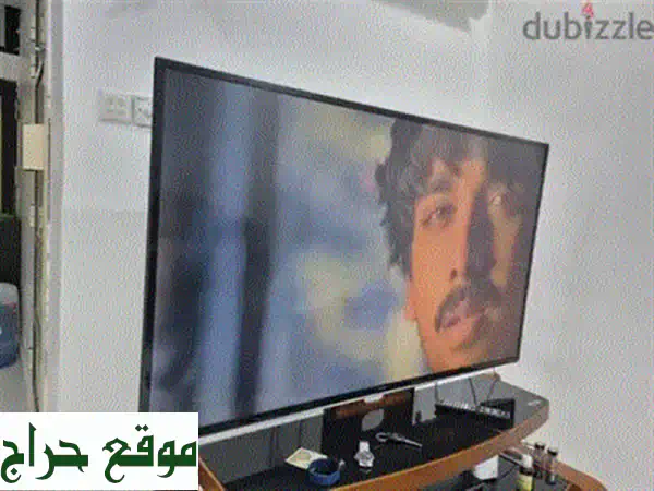 تلفزيون TCL الذكي LED 65 بوصة: تجربة مشاهدة سينمائية في منزلك!