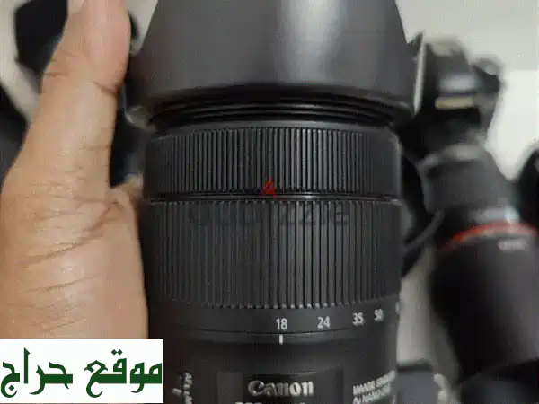 كاميرات كانون الاحترافية: عدسات 18-135مم و 75-300مم...