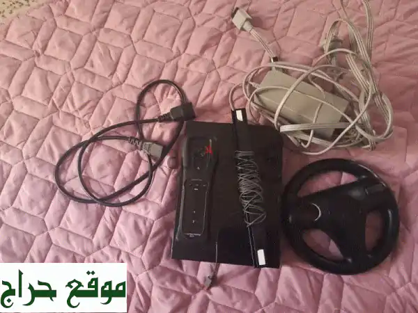 Wii U مستعملة بحالة ممتازة + ألعاب وملحقاتها! (عرض خاص)