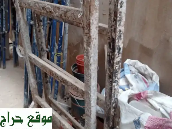 سقالة بويا وجبس مستعملة + عربية رمل + سلم + خشب!...
