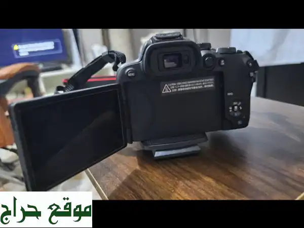 كاميرا كانون R10 بحالة ممتازة + عدسة 300mm + ملحقات!...