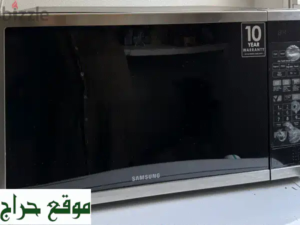 Samsung Microwave Oven with Auto Cook and Timer, 54 L, Black