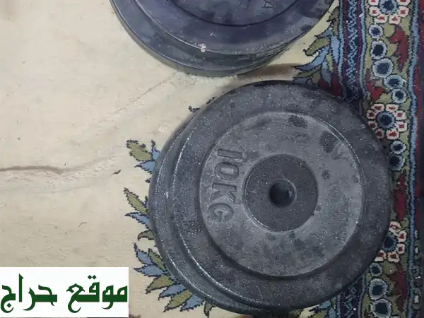مجموعة رفع أثقال كاملة للبيع - جديدة و بحالة ممتازة!