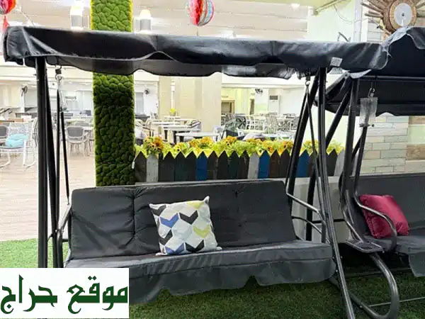 استمتع بلحظات راحة لا تُنسى مع مرجحة الحديقة الأنيقة!