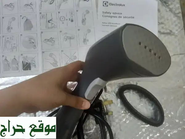 مكواة بخار رمادية داكنة - بحالة ممتازة! 60 درهم فقط!