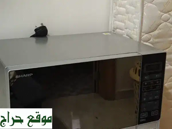 فرن مايكرويف شارب بحالة ممتازة - كالجديد! (شواية + تقنية الحمل الحراري)