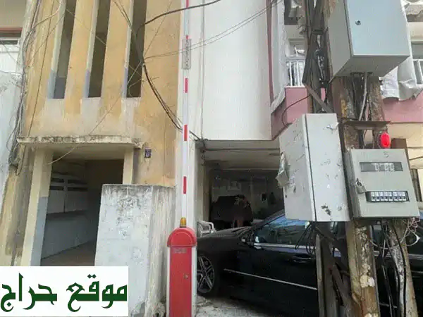 بوابة كهربائية Barrière للبيع في الأشرفية - بحالة ممتازة! (مع 2 ريمونت Somfy)